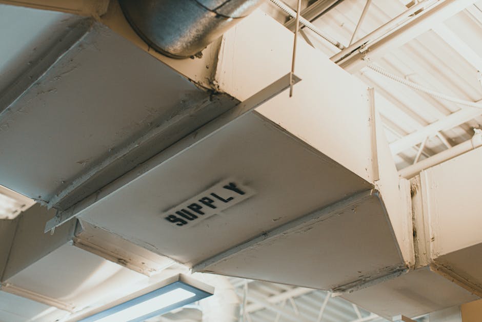 AC drain line clogged airflow context: close-up view of an HVAC supply air duct labeled SUPPLY, part of the ductwork system the indoor air handler feeds and where airflow stops the moment an AC drain line clogged trips the float switch