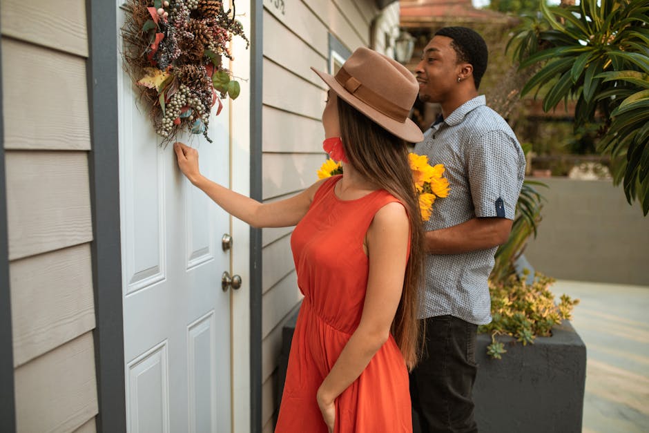 Doorbell not working everyday consequence: a man and woman knocking on a door decorated with a wreath and holding flowers, the universal symptom of a doorbell not working