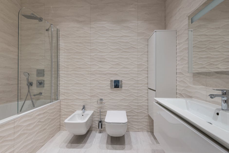 Toilet keeps clogging solved: elegant modern bathroom with minimalist design and stylish fixtures, the target healthy fixture state after a toilet keeps clogging fix