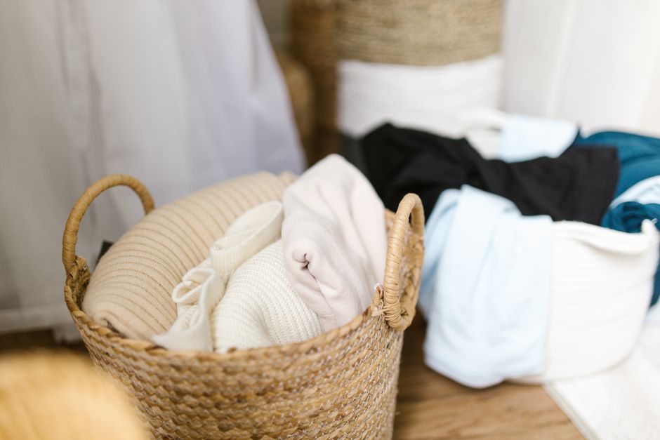 Dryer not spinning outcome: neatly folded clean laundry organized in woven baskets, the result you want once the dryer not spinning problem is fixed and the drum turns again