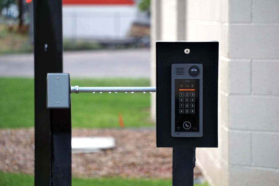 Doorbell not working: an outdoor intercom and doorbell unit mounted at a residential building entrance, the typical homeowner setup for a doorbell not working diagnosis