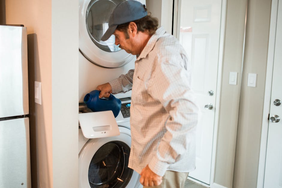 Dryer not heating: stacked residential washer and dryer in a modern laundry room