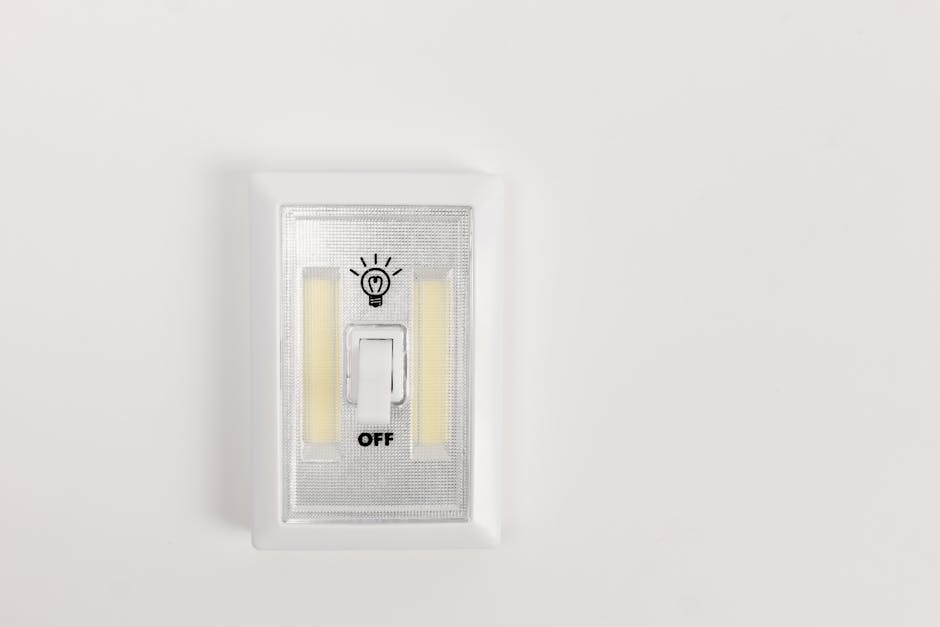 Light switch not working: a minimalist single-pole light switch turned off on a plain white wall, the classic homeowner setup for a light switch not working diagnosis
