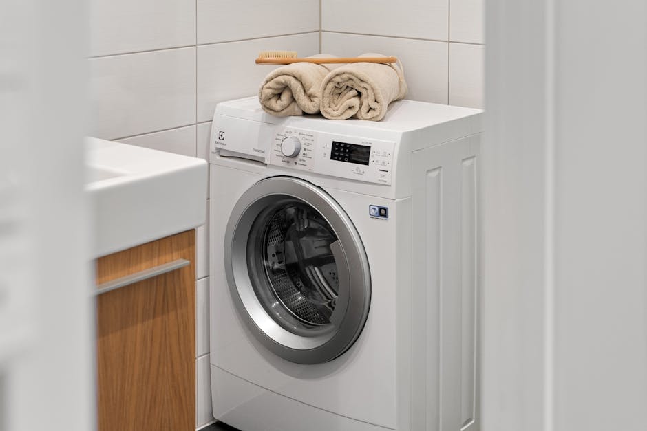 Adjusting the leveling feet to stop a washing machine vibrating