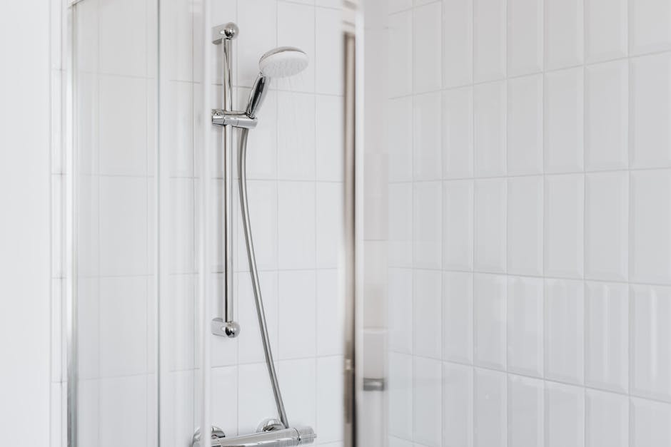 Homeowner checking a bathroom drain after fixing a toilet bubbling when flushed